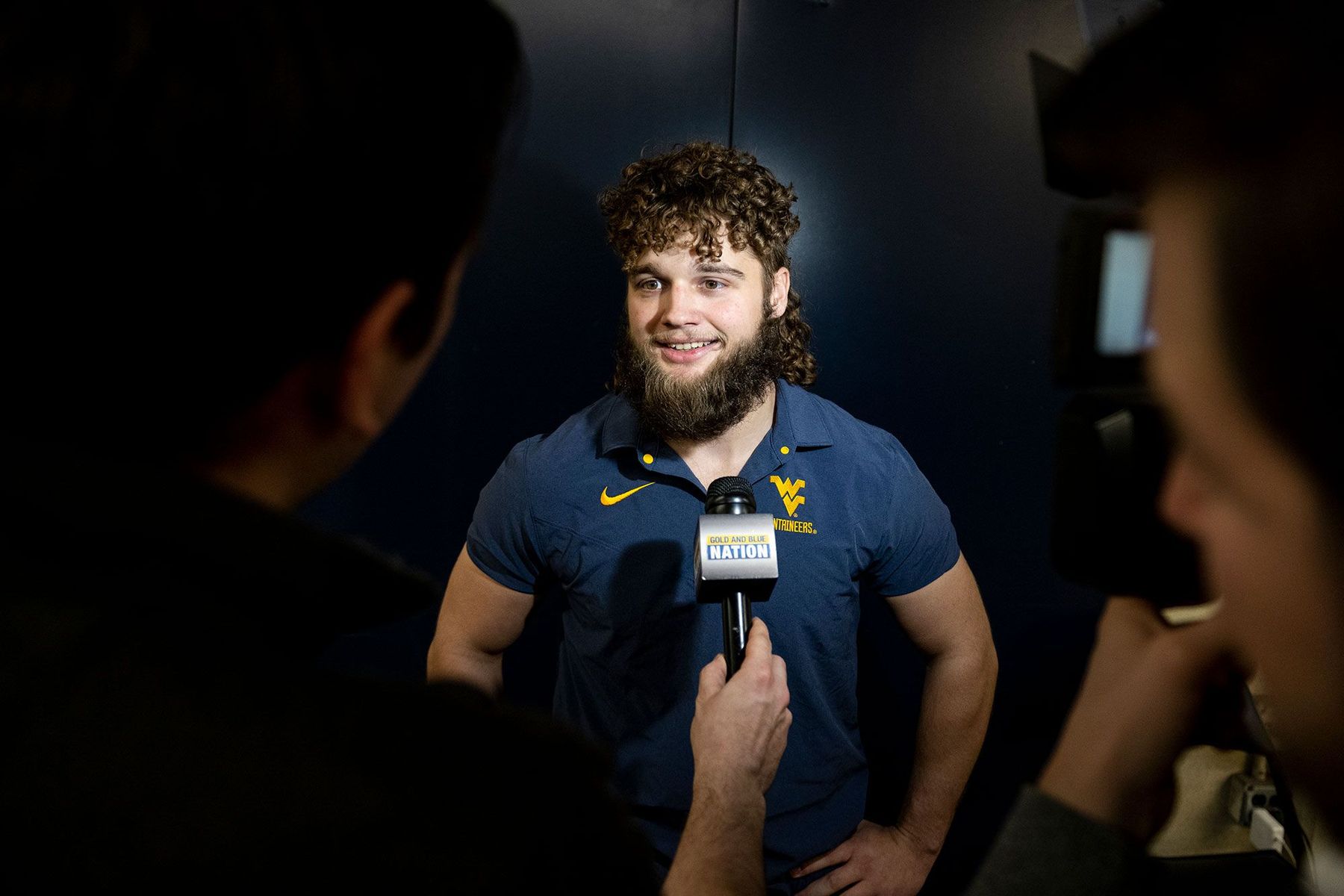 Mikel Hager being interviewed after becoming the Mountaineer mascot