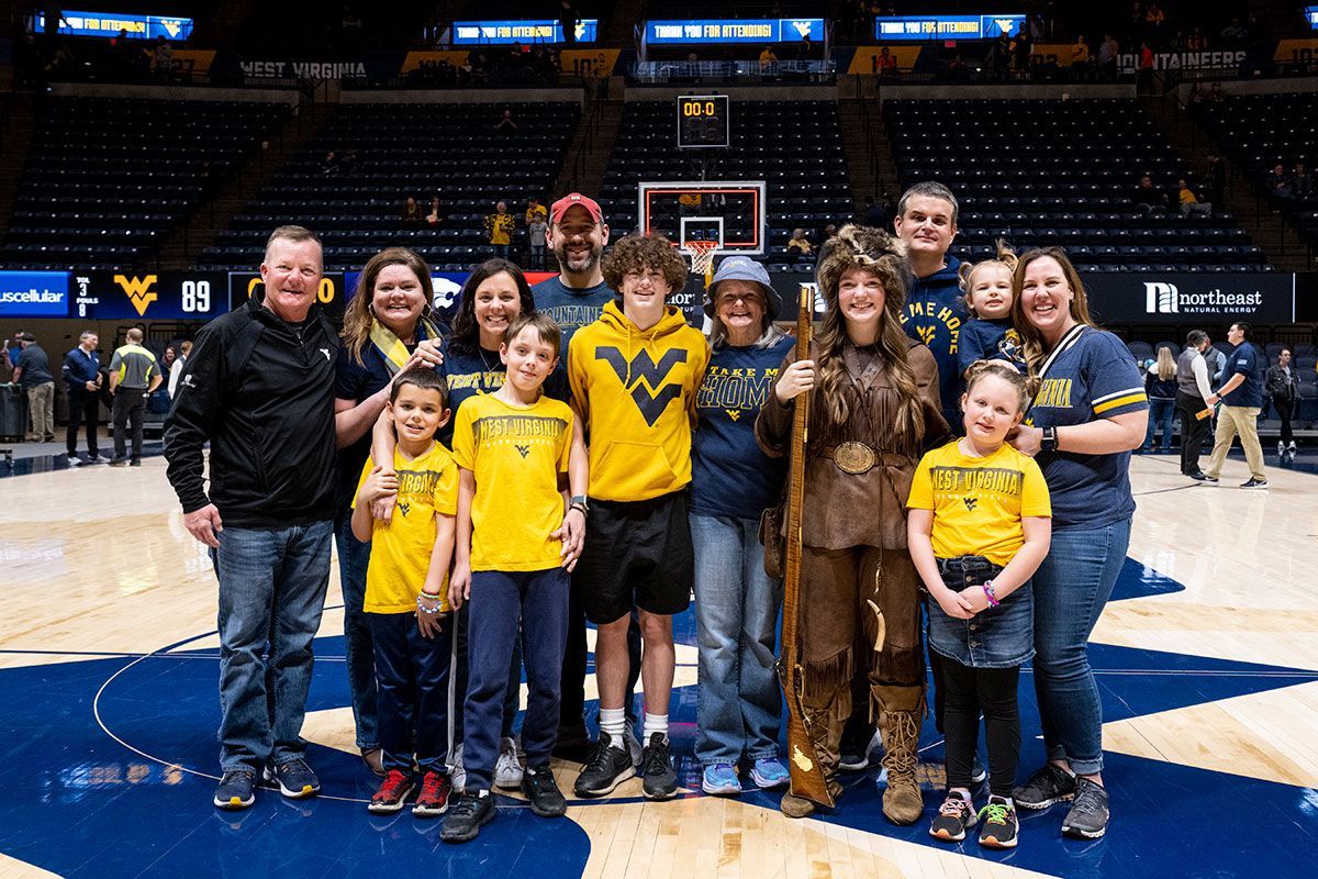 Mary Roush and her family on the court