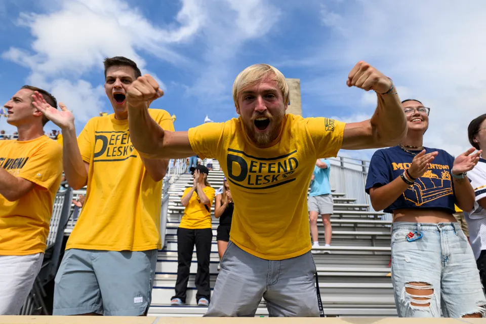 West Virginia students celebrate the Mountaineers win over No. 3 Portland. 